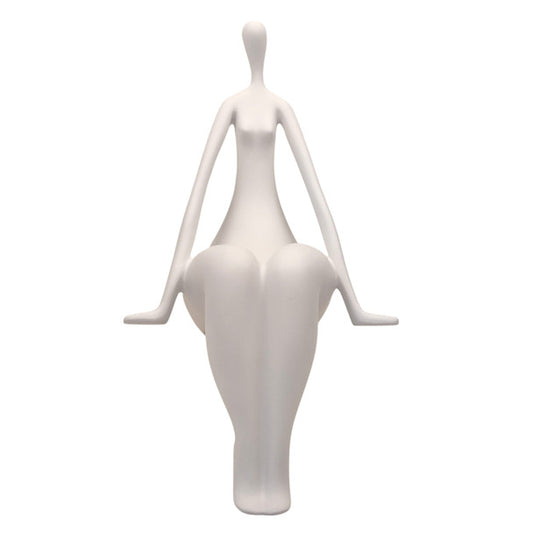 WHITE SPECKLED LADY SITTING ON LEDGE